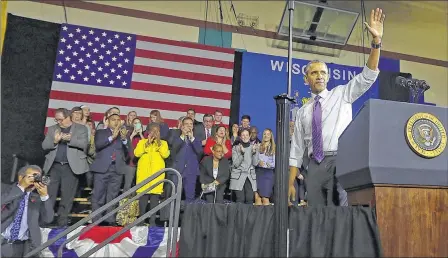  ??  ?? President Barack Obama waves to the crowd Thursday as he finishes his speech at the United Community Center. The president came to Milwaukee to honor the city for winning the White House’s Healthy Communitie­s Challenge. More photos and video at...