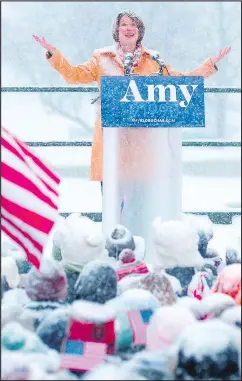  ?? GETTY IMAGES ?? Amy Klobuchar announces her candidacy for president during a snow fall Sunday in Minneapoli­s.