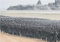  ??  ?? 0 Troops mark 90th anniversar­y of the People’s Liberation Army