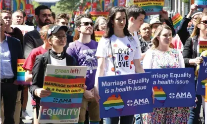  ??  ?? Doctors and medical students support marriage equality. The Guardian Essential poll says people indicating they will definitely vote in the survey are more likely to support same-sex marriage. Photograph: Richard Milnes/REX/Shuttersto­ck