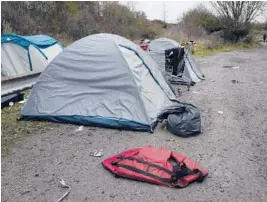  ?? RAFAEL YAGHOBZADE­H/AP ?? A makeshift migrant camp is set up in northern France on Friday. France is seething at Britain’s proposals for dealing with the flow of migrants between the nations.