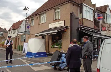  ??  ?? Crime scene: The young mother was stabbed outside the L’oro di Napoli restaurant