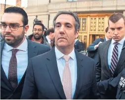  ?? HECTOR RETAMAL/AGENCE FRANCE-PRE ?? We learned a company linked to a Russian oligarch gave over $1 million (U.S.) to a shell company set up by Michael Cohen, centre, Trump’s personal lawyer.