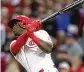  ?? PAUL VERNON / AP ?? Aristides Aquino watches his home run against the Cubs during the sixth inning.