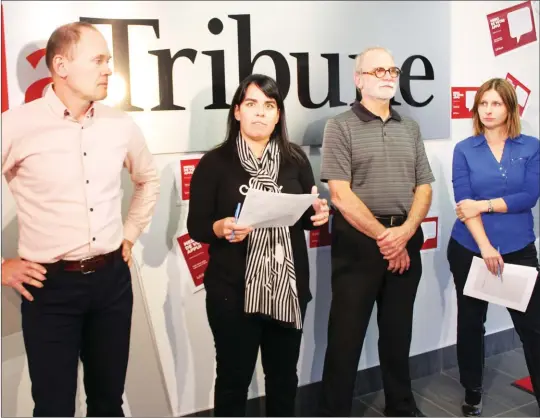  ?? GORDON LAMBIE ?? Louis-éric Allard, Mélanie Noel, Alain Leclerc, and Isabelle Pion, four members of La Tribune's relaunch committee, gathered in the local newspaper's lobby on Monday afternoon to encourage the population to put their money where their mouth is with regard to an effort by employees to save the paper by creating a workers' cooperativ­e