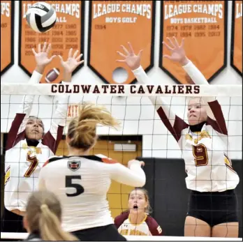  ?? Staff photo/Corey Maxwell ?? New Bremen’s Kaylee Freund (7) and Ellie Tangeman (9) attempt to block a shot over the net during a Midwest Athletic Conference volleyball match on Tuesday at Coldwater High School.