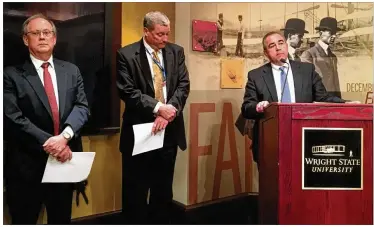  ?? MAX FILBY / STAFF ?? Wright State University officials speak at a press conference following the release of an audit report. Dennis Andersh, executive director of the Wright State Research Institute, stands at far left to Doug Fecher, vice chairman of the WSU board of...
