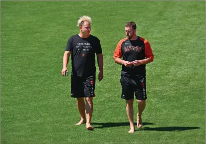  ?? JOSE CARLOS FAJARDO — BAY AREA NEWS GROUP ?? San Francisco Giants' Joc Pederson, left, walks with mental skills coach Harvey Martin, before their game at Oracle Park on Friday.