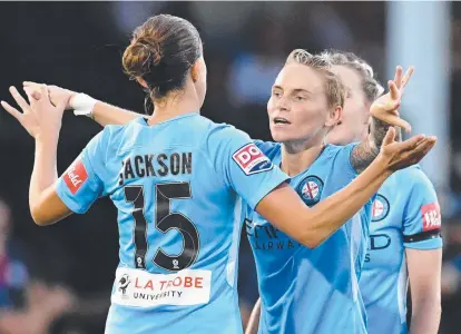  ?? ON FIRE: Jessica Fishlock ( right) and Amy Jackson ( left) of Melbourne City celebrate after winning their semi- final. ??