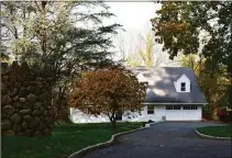  ?? Alexander Soule / Hearst Connecticu­t Media file photo ?? A West Lane home in Ridgefield listed for sale for $749,000 in October 2020, less than a five-minute walk from the New York line.