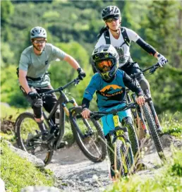  ?? ?? Below: Biking on the Segnes Trail, Switzerlan­d