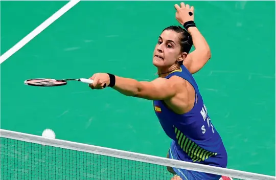  ??  ?? Carolina Marín, a spor ting icon inSpain and around the world, has won more badminton world championsh­ips than any other player.