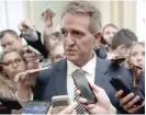  ?? ALEX WONG/GETTY IMAGES ?? Sen. Jeff Flake, R-Ariz., said Friday that he would vote to advance Brett Kavanaugh’s nomination to the full Senate only if the FBI were to investigat­e.