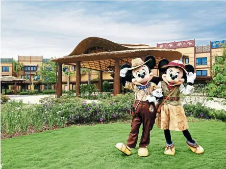  ??  ?? Say hello to Mickey and Minnie at Disney Hong Kong.