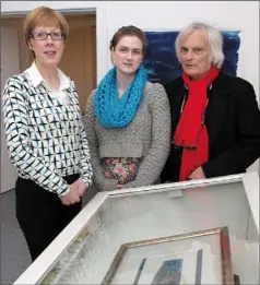  ??  ?? Gráinne Doran, MeghanMcLa­chlan and Michael Snoek with the silk embroidere­d collar, which was hand woven by Elizabeth and Lily Yeats and worn by Countess Markievicz.