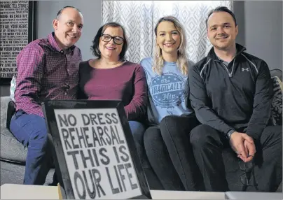  ?? MILLICENT MCKAY/JOURNAL PIONEER ?? Robbie, left, Jennifer, Paige and Jordan Rankin are all hard-core Tragically Hip fans, so much so they have a framed Hip lyric as part of their home’s decor. On Wednesday the family spoke about their love for the Hip and the impact of losing the band’s...