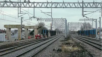  ??  ?? The view looking south from Bletchley station on January 10 to what remains of the Flyover across the West Coast Main Line, which is being rebuilt to include new high level platforms for EWR services. Phil Marsh