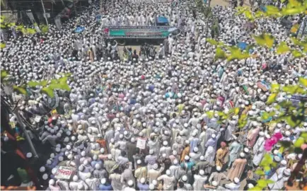  ?? Munir Uzzaman, AFP ?? Muslims in Dhaka, Bangladesh, gather near the Myanmar embassy Monday to protest violence against the country’s Rohingya Muslims. More than 10,000 participat­ed in the protest.