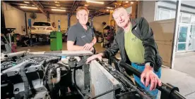  ?? Photo / Paul Taylor ?? Ex-Army infantry officer Jason Lee with his old Sergeant Major Andy Kells making plans for the New Zealand Remembranc­e Army’s next cleanup of headstones.