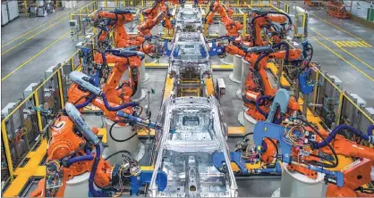  ?? PHOTOS PROVIDED TO CHINA DAILY ?? China’s first aluminum car body workshop, run by Chery Jaguar Land Rover Automotive, is located in Changshu, Jiangsu province.