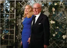  ?? ?? The Associated Press
Jerry Hall and Rupert Murdoch arrive for a State Dinner with French President Emmanuel Macron and President Donald Trump at the White House in 2018.