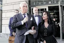  ?? Julio Cortez / Associated Press ?? Roger Stone leaves court Friday with his wife, Nydia, after being convicted of charges including lying to Congress.