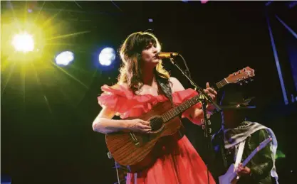  ?? Gary Miller / Getty Images 2021 ?? Nikki Lane and Charlie Sexton perform in Austin, Texas, last year. Lane’s new album has many influences, yet still manages to sound in the spirit of her South Carolina roots.