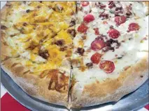  ?? COURTESY OF ZEPPO’S PIZZA ?? Order it any way you like at Zeppo’s Pizza, which recently opened in the former Cubbies location at 9510 Hageman Road.