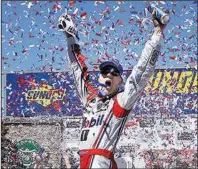  ?? AP/BEN MARGOT ?? Kevin Harvick managed to earn his first victory of the season and clinched a spot in the NASCAR playoffs in the process. Harvick held off racing teammate Clint Bowyer to win the Toyota Save/Mart 350 on Sunday at Sonoma Raceway in Sonoma, Calif.