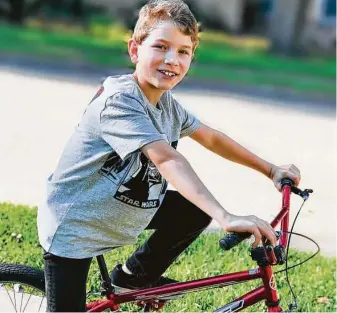  ?? Courtesy Peterzen family ?? Victor Peterzen was fatally hit on Sept. 1 while riding the bike he got for his 10th birthday. The driver was not charged because Victor failed to yield at a stop sign, according to police.