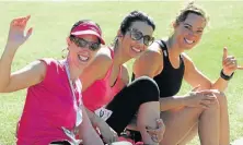  ?? Picture: BRIAN WITBOOI ?? DONE AND DUSTED: Friends, from left, Alison Gerber, Nerissa Walton and Natalie Macleod at the Aspen Pharmacare Marathon in Lorraine last Sunday