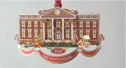  ?? AP ?? The White House Historical Associatio­n’s 2022 Christmas Ornament honors President Richard M. Nixon’s administra­tion and gives a nod to first lady Pat Nixon, who first put a gingerbrea­d house on display in the State Dining Room for the holiday season.