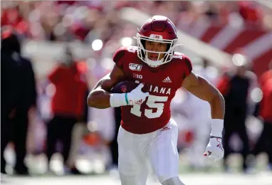  ?? ASSOCIATED PRESS ?? In this Oct. 12, 2019, file photo, Indiana wide receiver Nick Westbrook runs during the first half of an NCAA college football game against Rutgers, in Bloomingto­n, Ind. Gone for the most part this year are access to in-person interviews, campus workouts and visits to team headquarte­rs. Those who competed in college all-star games but didn’t receive a combine invite, like Indiana receiver Nick Westbrook, have the advantage of performing in front of scouts.