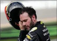  ?? AP/JOHN RAOUX ?? Jimmie Johnson removes his helmet after qualifying for the Daytona 500 on Sunday at Daytona Internatio­nal Speedway in Daytona Beach, Fla. Johnson, coming off the worst season of his career, is gearing up for a shot at his eighth NASCAR championsh­ip.