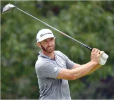  ?? — USA Today Sports ?? Dustin Johnson watches his tee shot on the 7th hole during the third round of the Fedex St Jude Classic tournament at TPC Southwind.