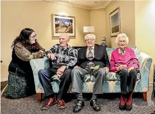  ?? MARION VAN DIJK/THE LEADER ?? Renee Hollis, left, with three of the people she interviewe­d and photograph­ed for her book, Ben Oakes, Max Sladen and Lorna Moffitt.