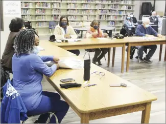  ?? Katie West • Times-Herald ?? The Forrest City School Board met in regular session recently to discuss district business. Board members, pictured from left, are: Annie Winfrey, Sandra Taylor, Evette Boyd, Evetta Whitby and Larry Devasier. Board members Joey Astin and Yolanda Mason did not attend the meeting.