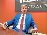  ?? Jon Gillooly ?? Times-Journal Inc. staffers sat down with Gov. Brian Kemp at his Cumberland campaign office on Tuesday to talk about his race for a second term, his record and the issues of the day.