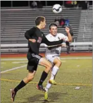  ?? AUSTIN HERTZOG - DIGITAL FIRST MEDIA ?? Boyertown’s Ben Wise and Spring-Ford’s Ronnie Minges compete for a header during their game on Oct. 11.