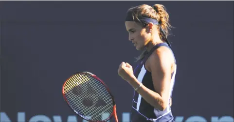  ?? Tyler Sizemore / Hearst Connecticu­t Media ?? Monica Puig celebrates in her quarterfin­al match against Caroline Garcia on Thursday. Puig won in 3 sets to advance to the semifinals.