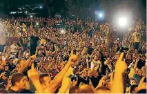  ?? PHOTO: REUTERS ?? Palestinia­ns shout slogans after evening prayers outside the Lion’s Gate of Jerusalem’s Old City.