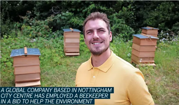  ?? ?? Samuel Merryweath­er with the bee hives outside Experian’s Sir John Peace building.