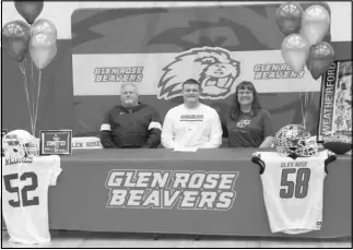  ?? Photo by Alexis Meeks ?? Glen Rose’s Andrew Weatherfor­d was surrounded by family as he signed to play with the Henderson State Reddies during National Signing Day.