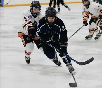  ?? STEVEN MAH/SOUTHWEST BOOSTER ?? Wildcats forward Cassidy Peters (centre) beat a Prince Albert Bears defender wide early in a 2-1 win on Saturday.