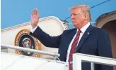  ??  ?? President Donald Trump waves as he arrives at the airport in Helsinki, Finland, on Sunday on the eve of his meeting with Russian President Vladimir Putin.
