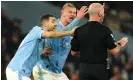  ?? Photograph: Martin Rickett/PA ?? Erling Haaland (centre) and Mateo Kovacic react after referee Simon Hooper stops play during Manchester City’s draw against Tottenham.