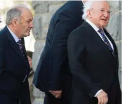  ??  ?? Mourners: Michael D Higgins at yesterday’s funeral