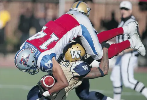  ?? CHRISTINNE MUSCHI/ REUTERS ?? Alouettes’ Brandon London is tackled by Winnipeg Blue Bombers’ Johnny Sears Jr. on Monday in Montreal.