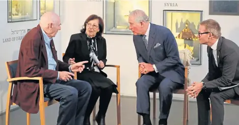  ?? Picture: PA. ?? Prince Charles meets George Shefi and Marta Wise at a reception at the Israel Museum in Jerusalem.