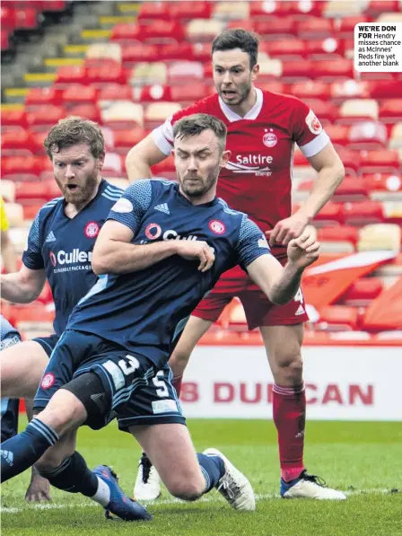  ??  ?? RED-LETTER DAY Dons ace McCrorie cuts a frustrated figure after 10th league draw
WE’RE DON FOR Hendry misses chance as McInnes’ Reds fire yet another blank